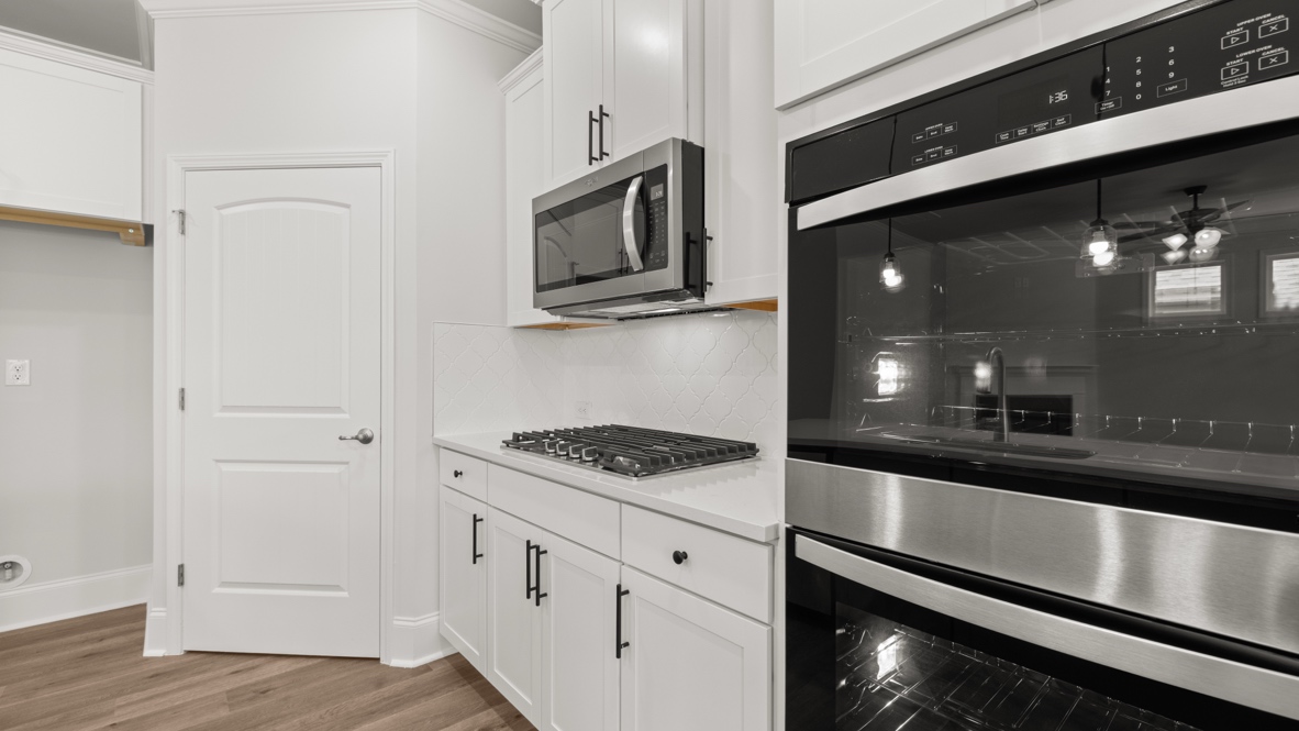 Interior kitchen with white cabinets