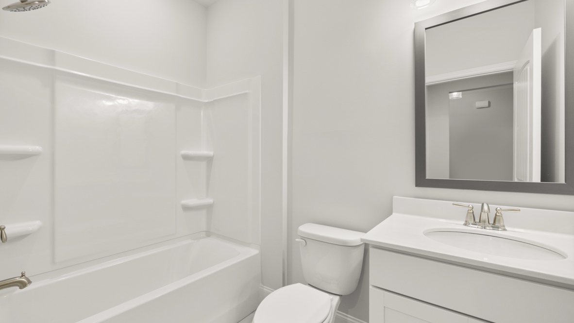 Interior bathroom with full-sized shower and sink