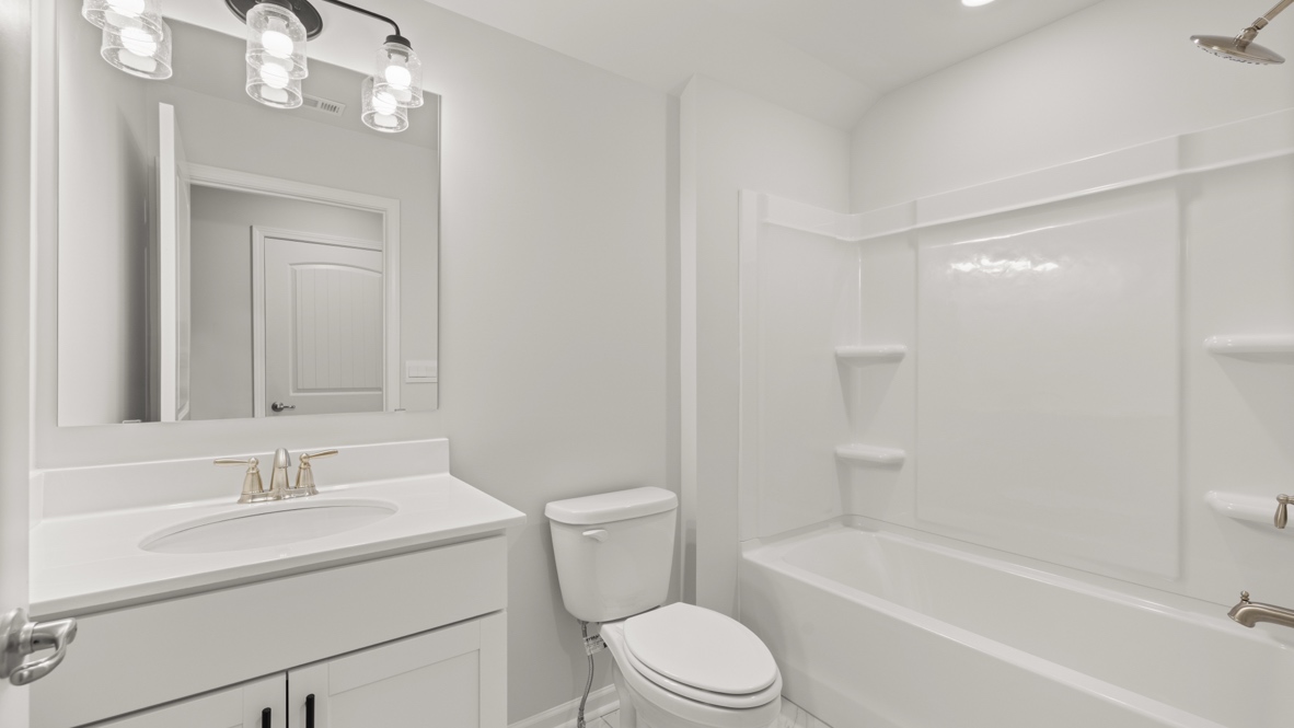 Interior bathroom with sink and full-sized shower