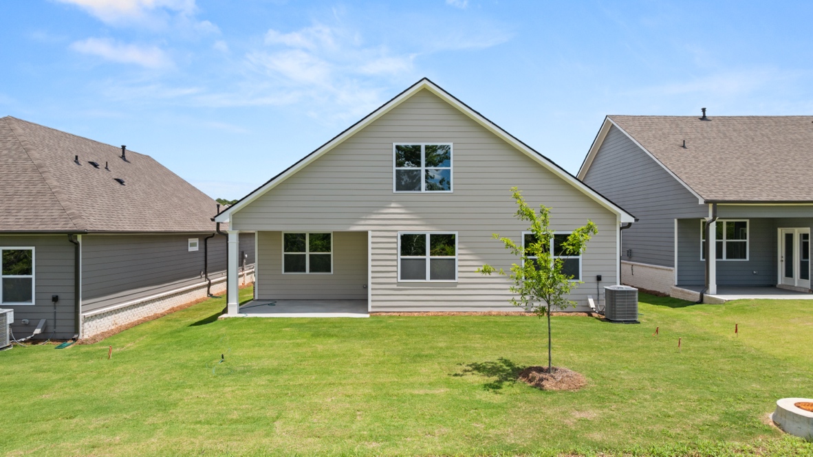 Exterior view of back yard and home