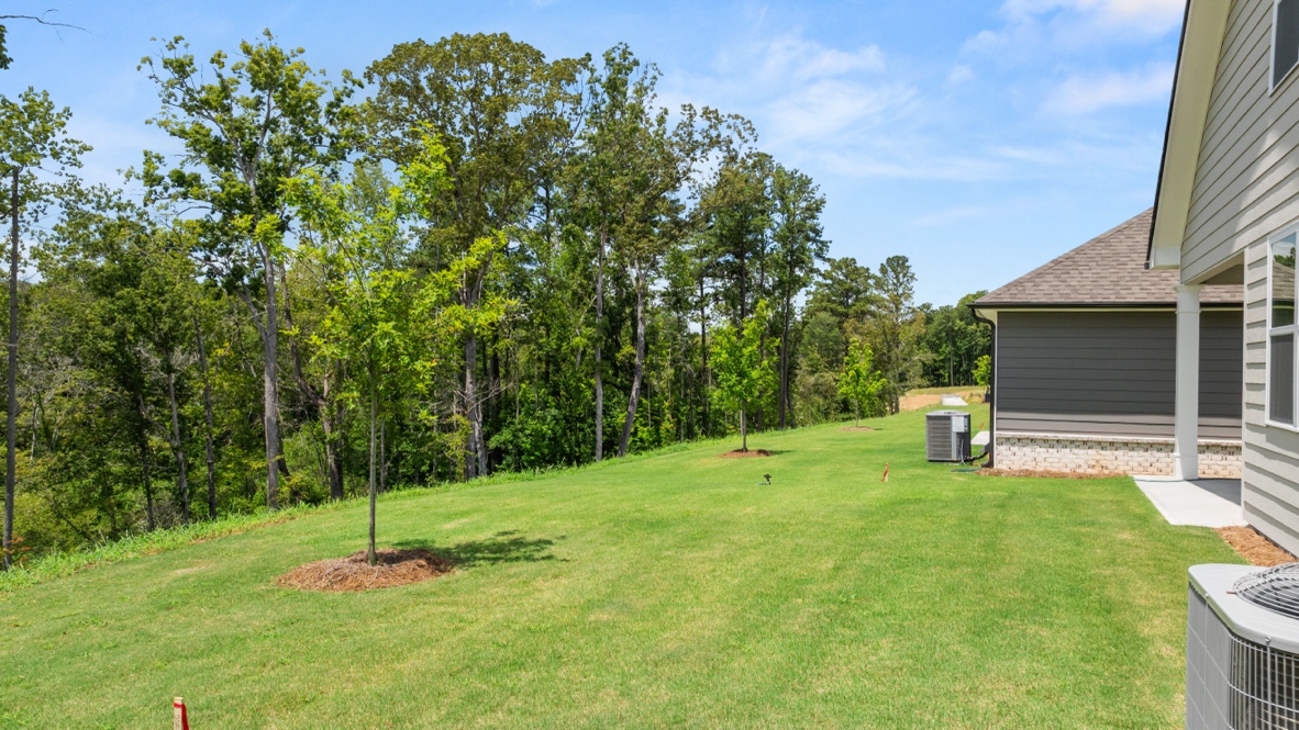 Exterior view of back yard and home