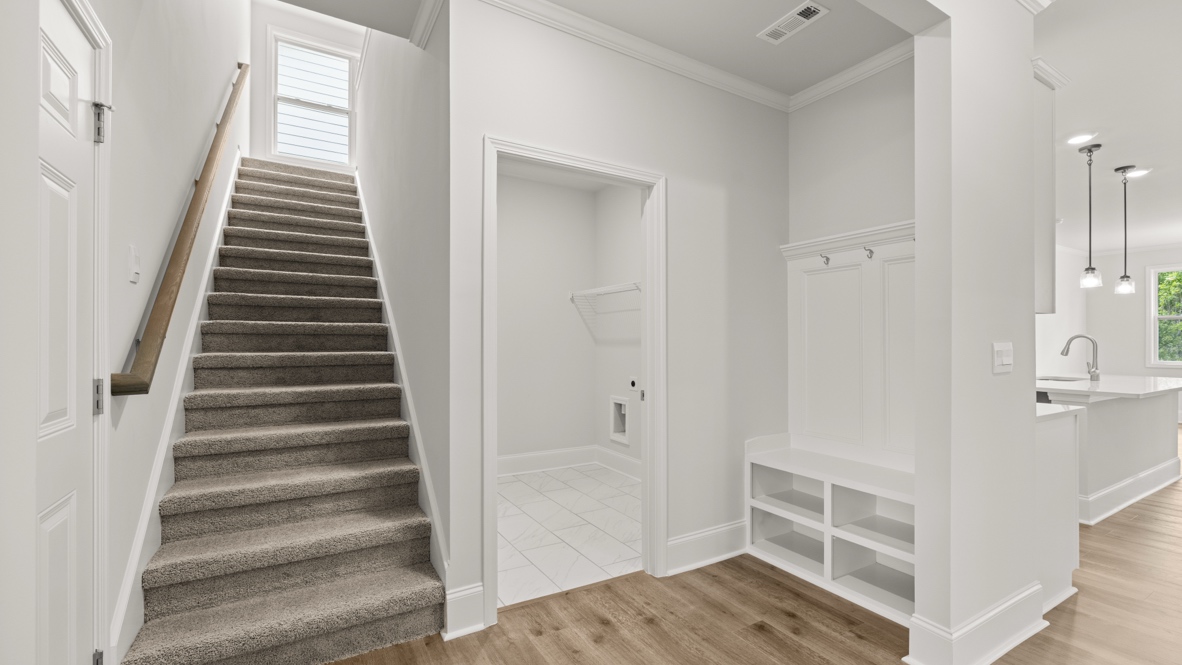Interior hallway open to staircase