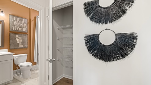 bathroom with a vanity sink, toilet and shower