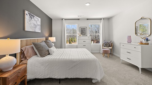 secondary bedroom with two large windows