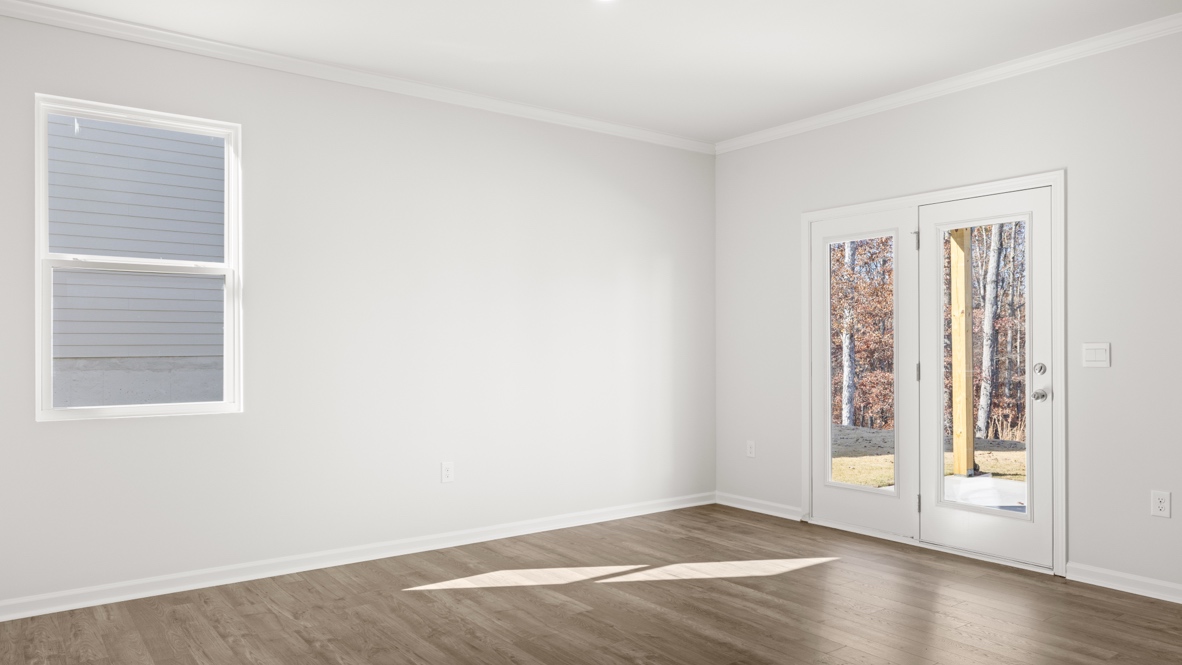 Interior living area with window and back patio doors