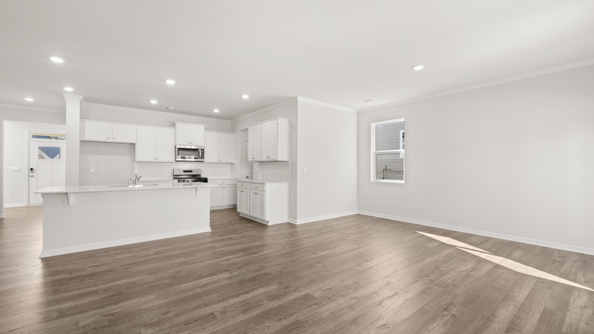 Interior living area open to kitchen with center island