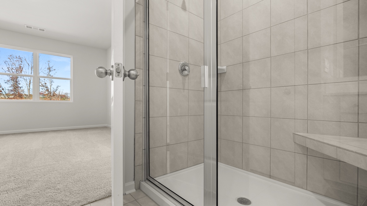 Interior primary bathroom with shower