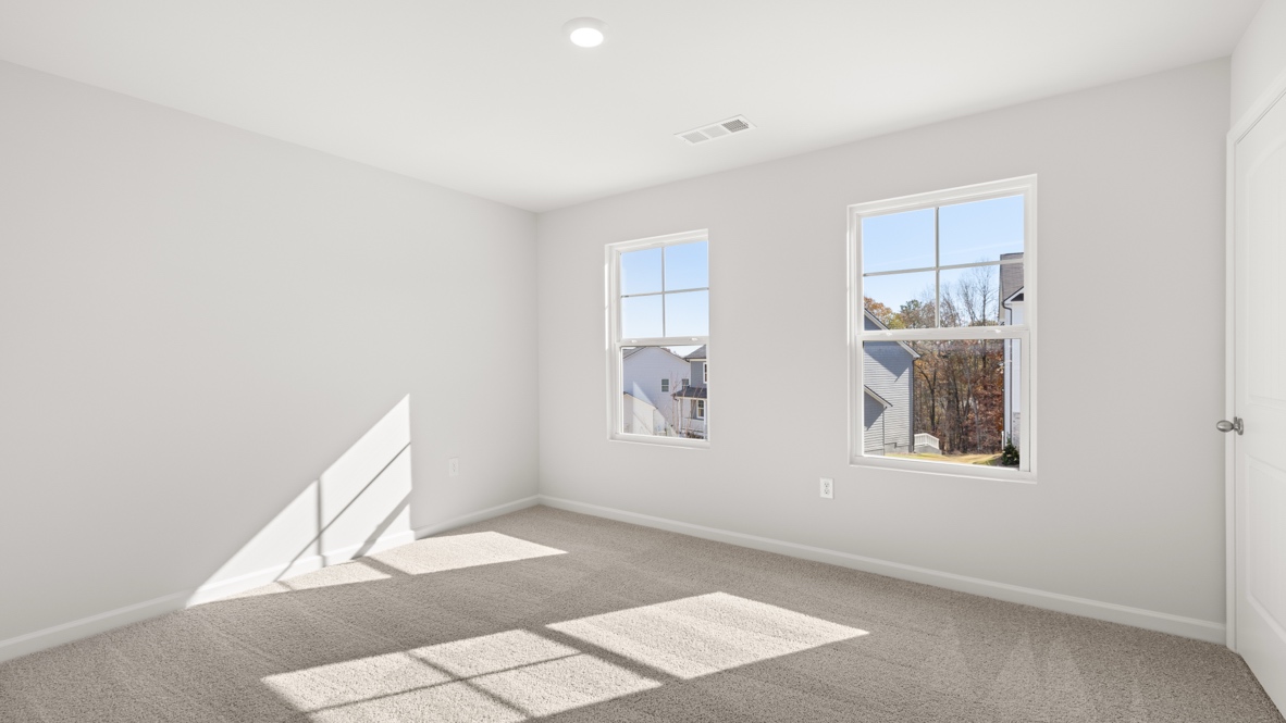 Interior bedroom with windows