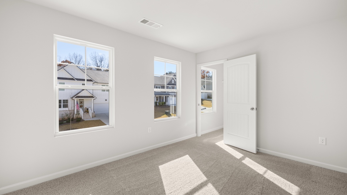 Interior bedroom with windows