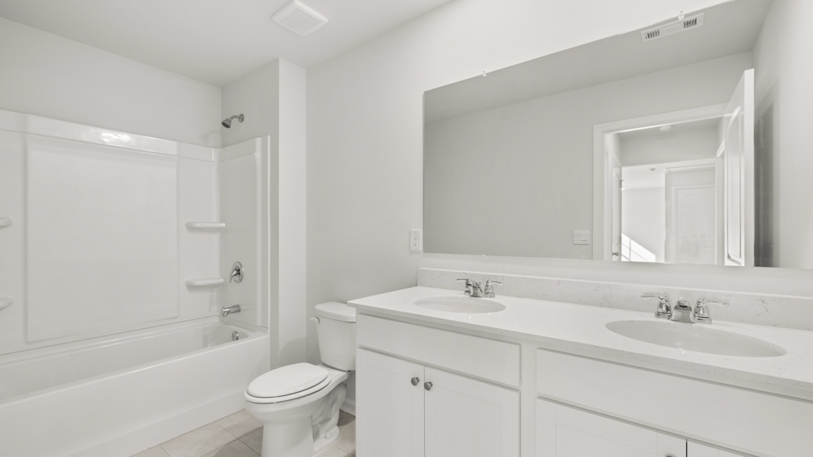 Interior bathroom with double sink and shower