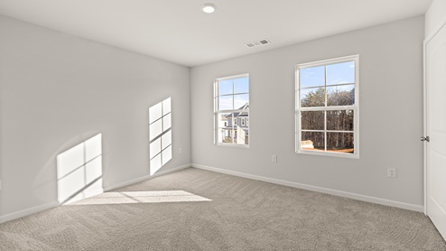 Interior bedroom with large windows