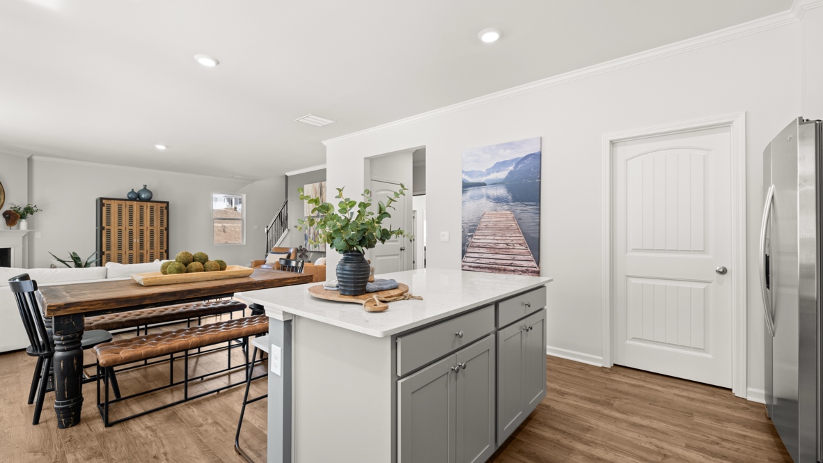 Interior kitchen with center island open to living area