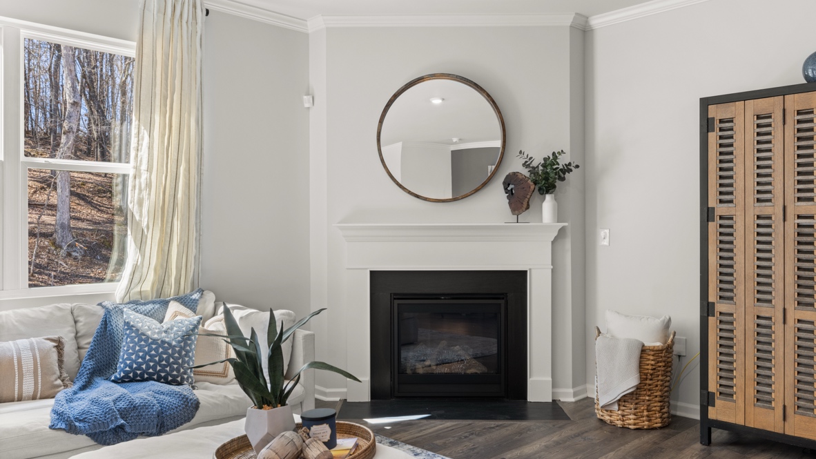 Interior living area with large windows and fire place