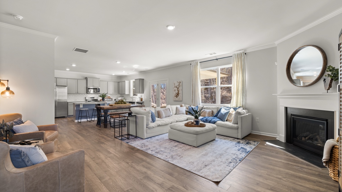 Interior living area with large windows and fire place