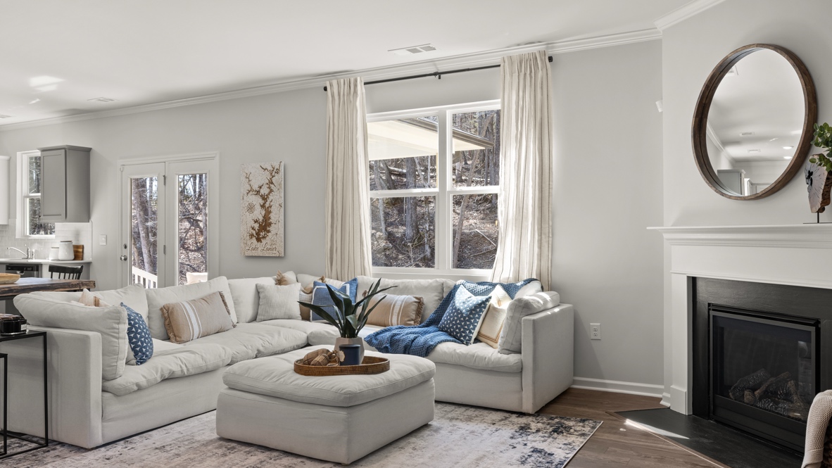 Interior living area with large windows and fire place