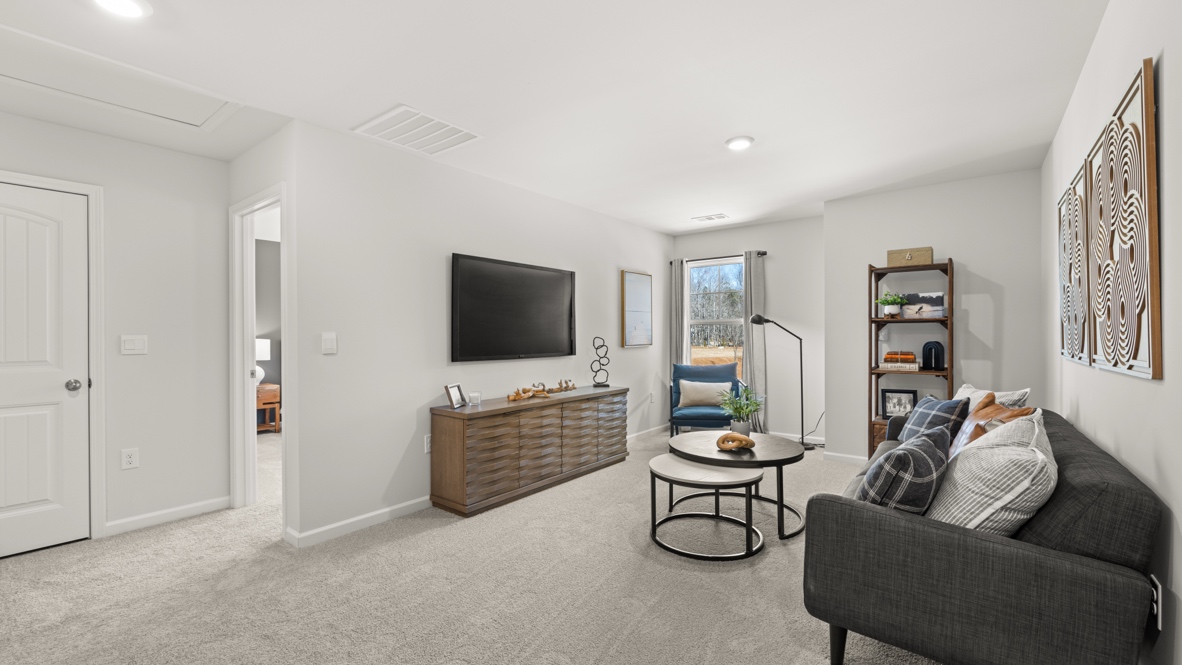 Interior upstairs loft area with window