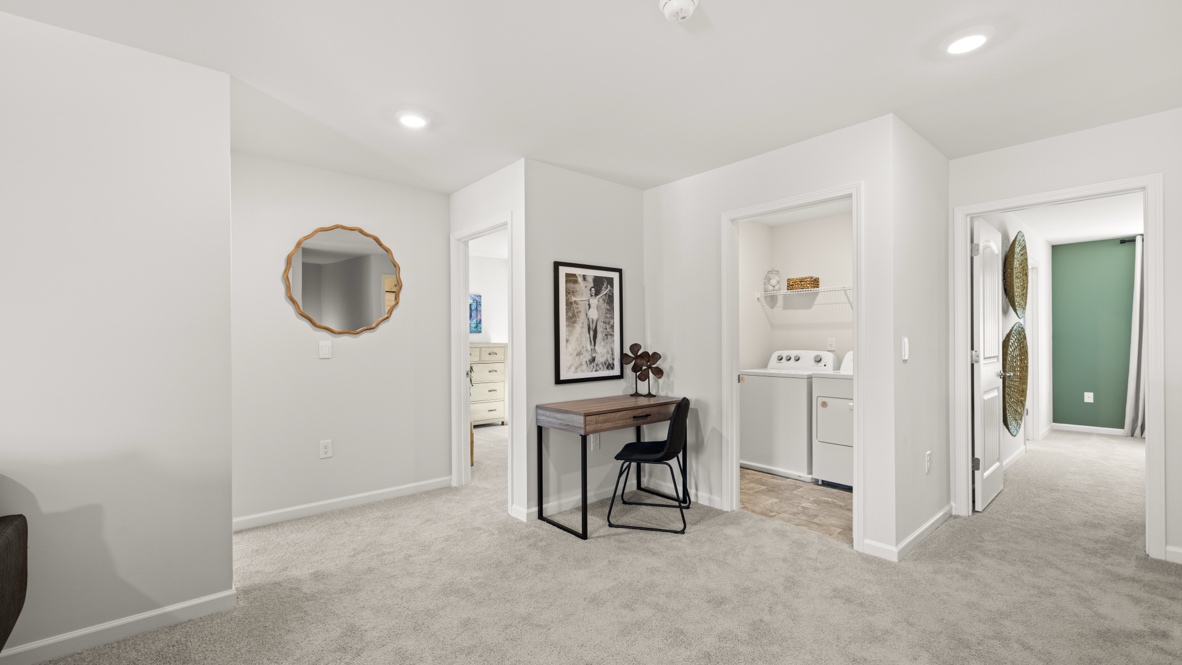 Interior upstairs loft area open to staircase