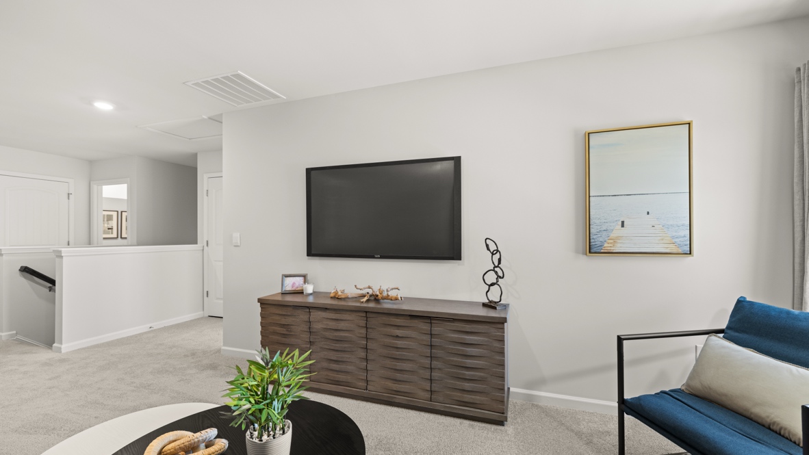 Interior upstairs loft area open to staircase