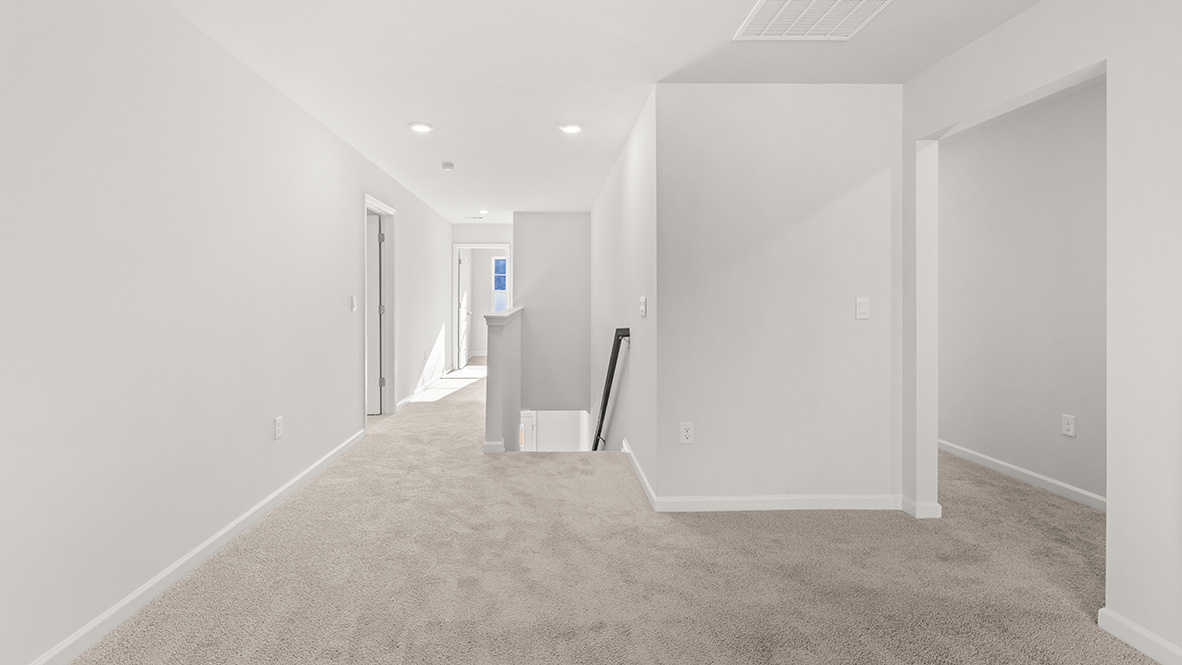 Stair landing upstairs for the Halton floorplan at Falcon Landing in Gainesville, GA
