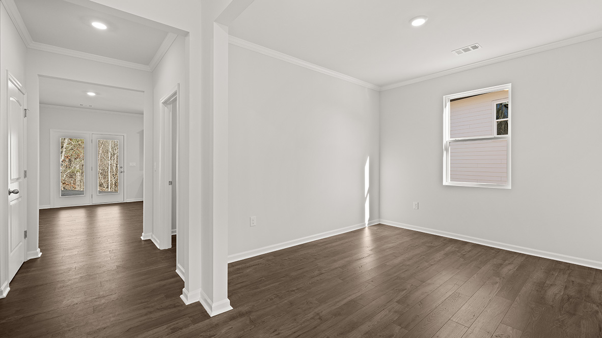 Spacious dining room next to the entrance of the home