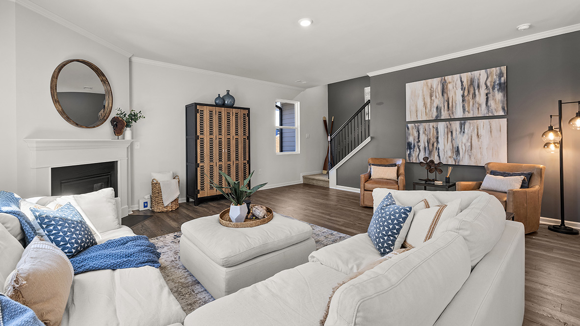 Interior living area with fire place open to kitchen