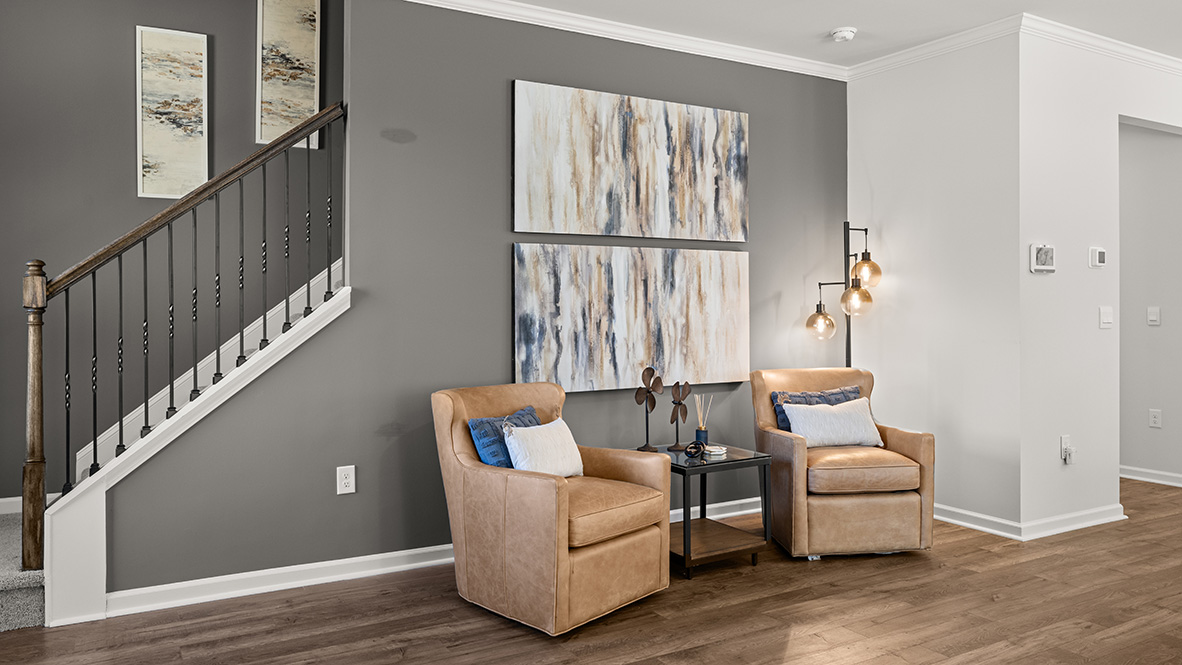 Interior living area with fire place open to kitchen