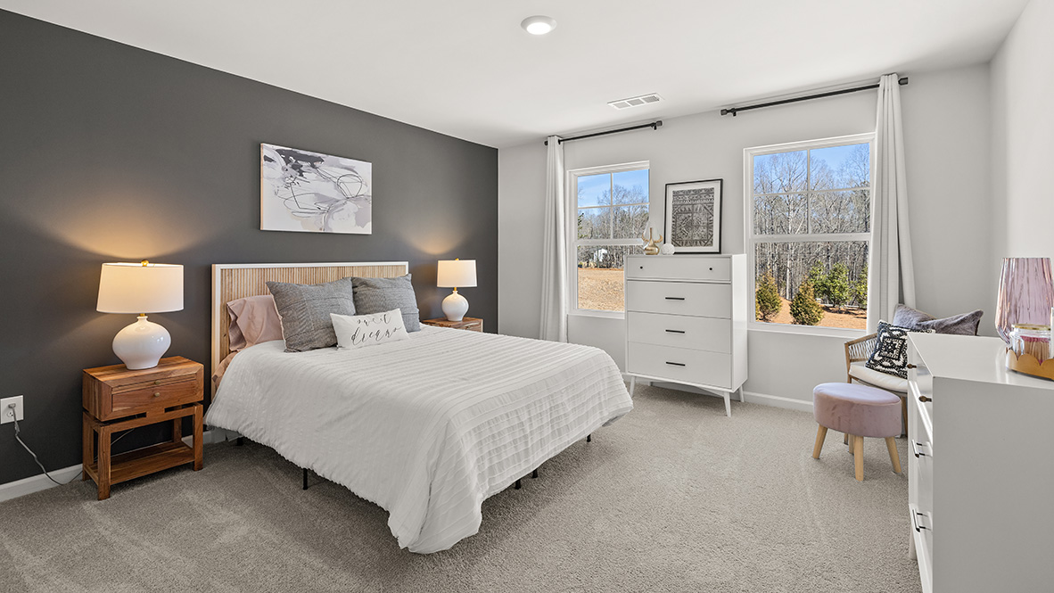 Interior bedroom with two windows