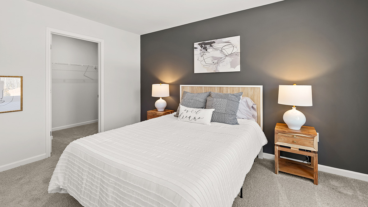 Interior bedroom with two windows