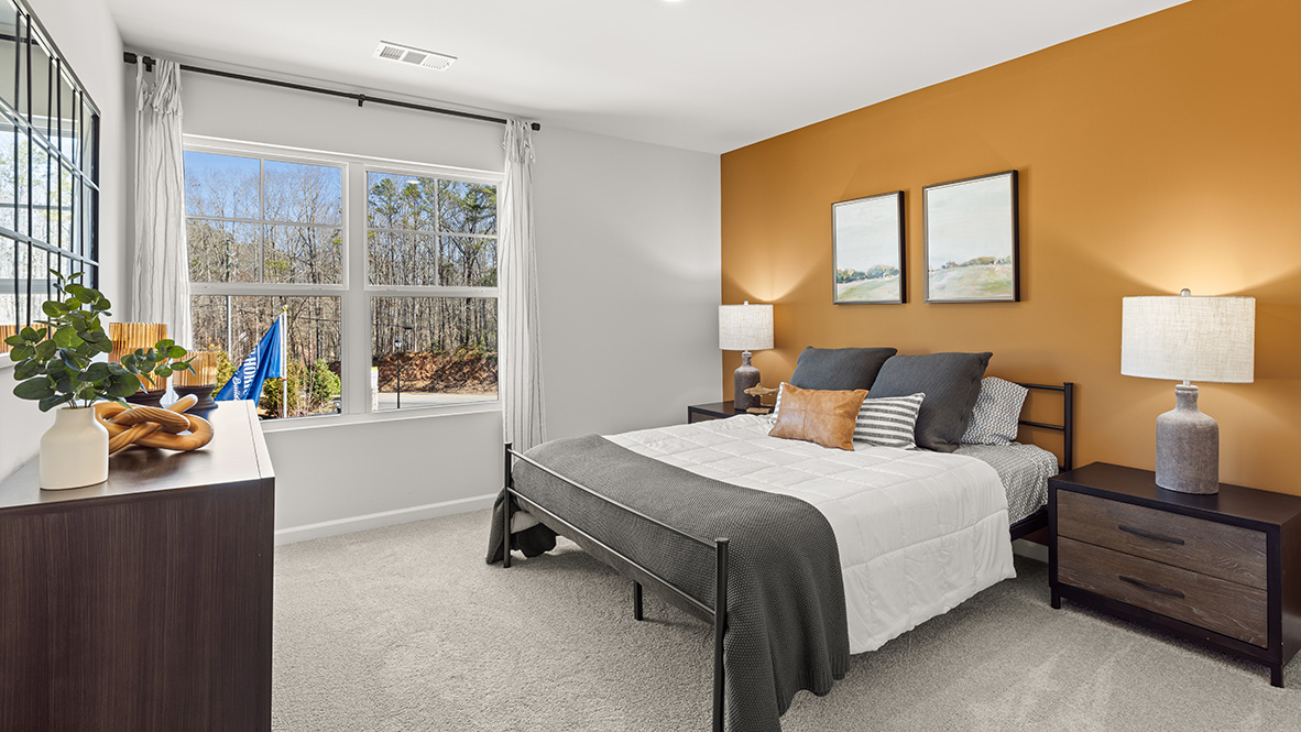 Interior bedroom with large window and closet