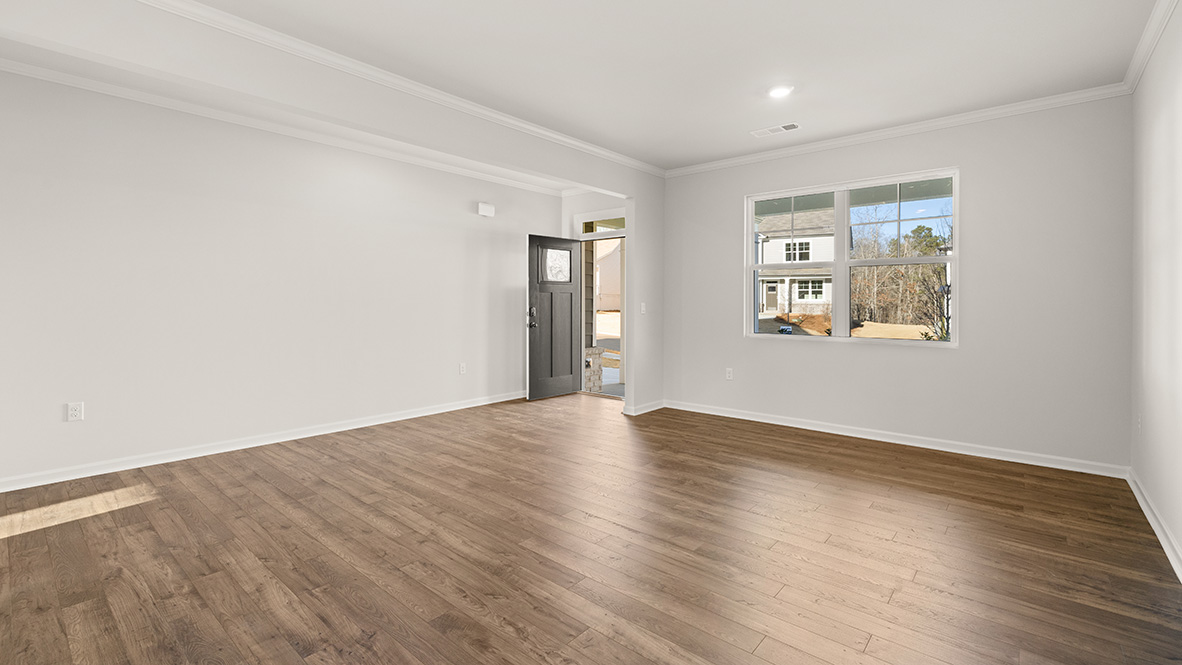 Spacious dining room next to the entrance of the home