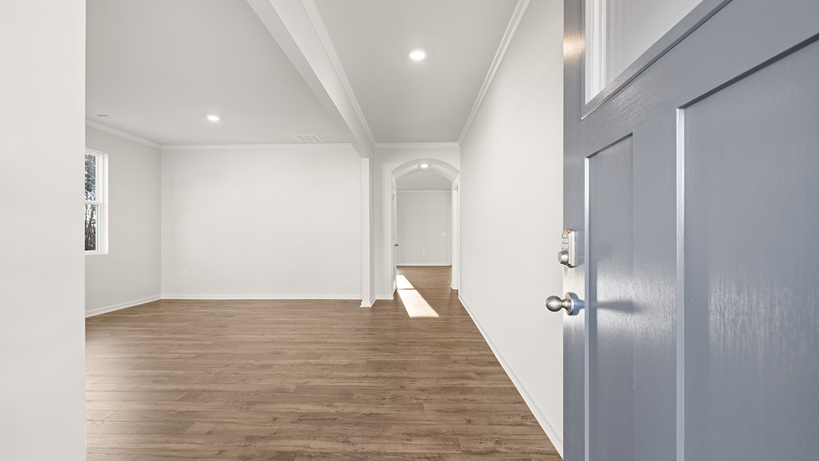 entry door with adjacent living area.