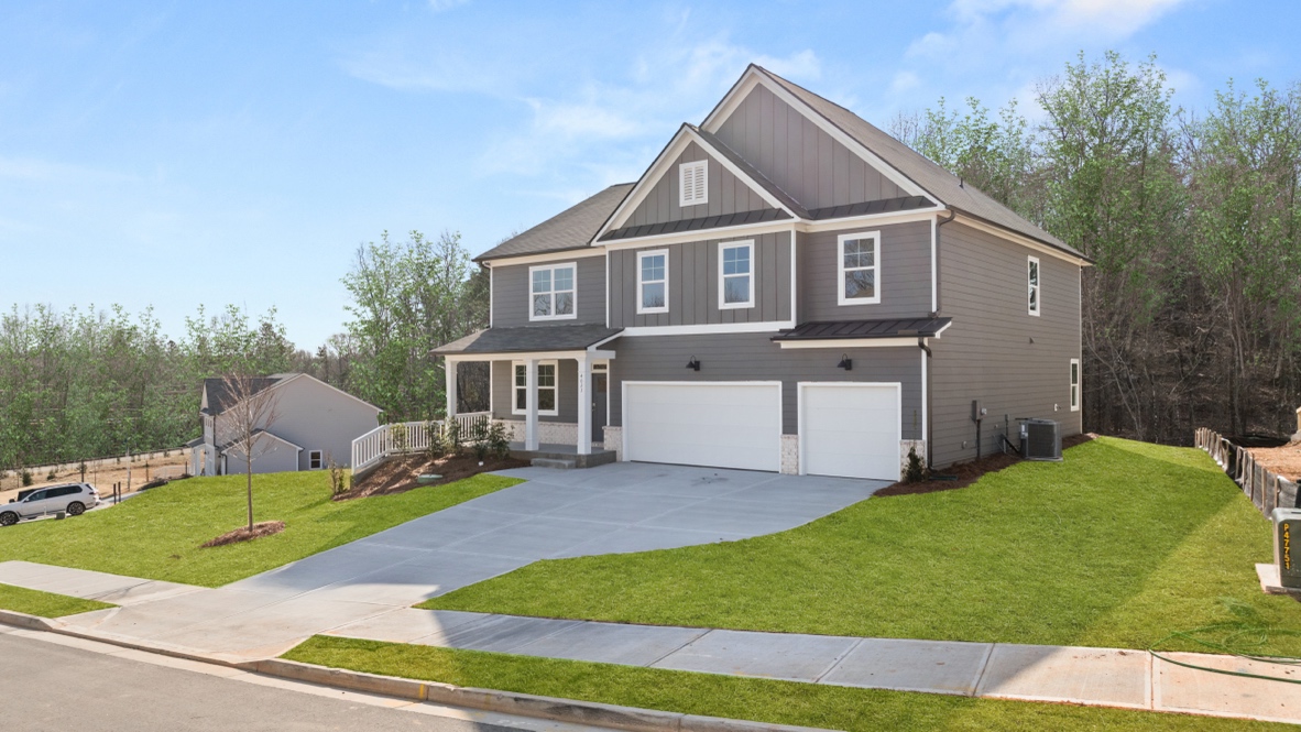 Exterior two-story home with cladding