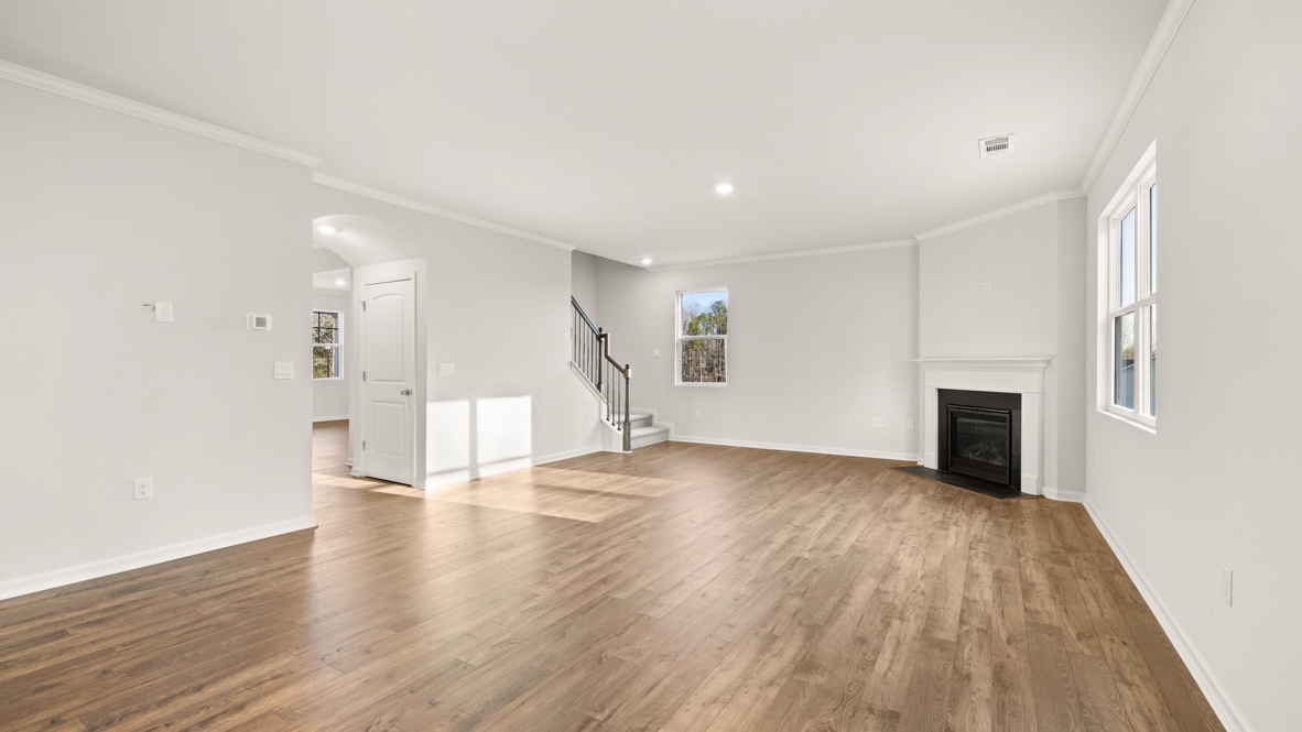 Interior living area with fire place and large windows