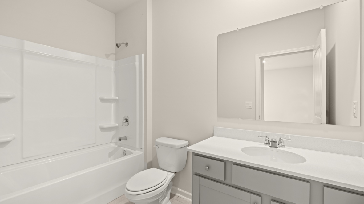 Interior bathroom with sink and full-sized shower