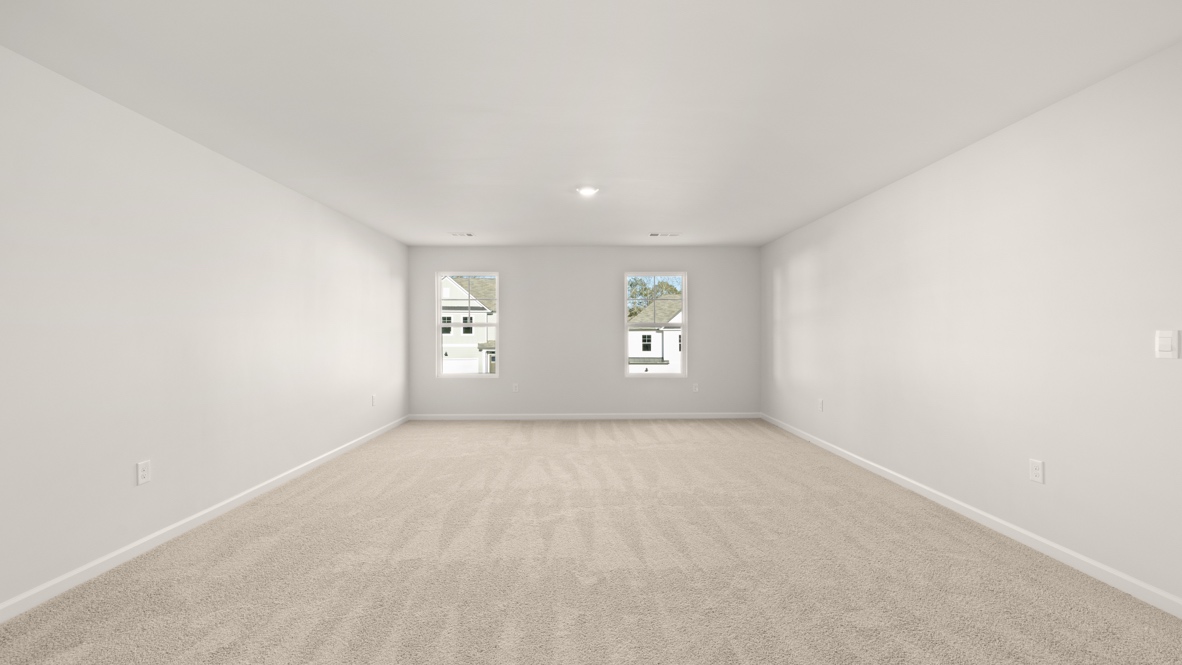 Interior upstairs loft area open to to staircase