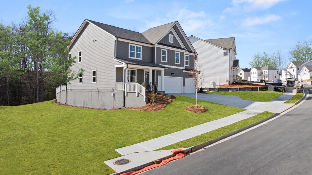 Exterior two-story home with cladding