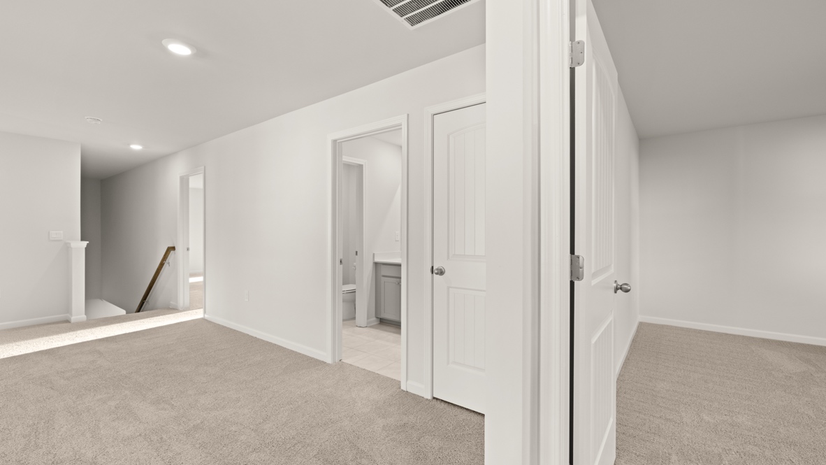 Interior upstairs loft area open to to staircase