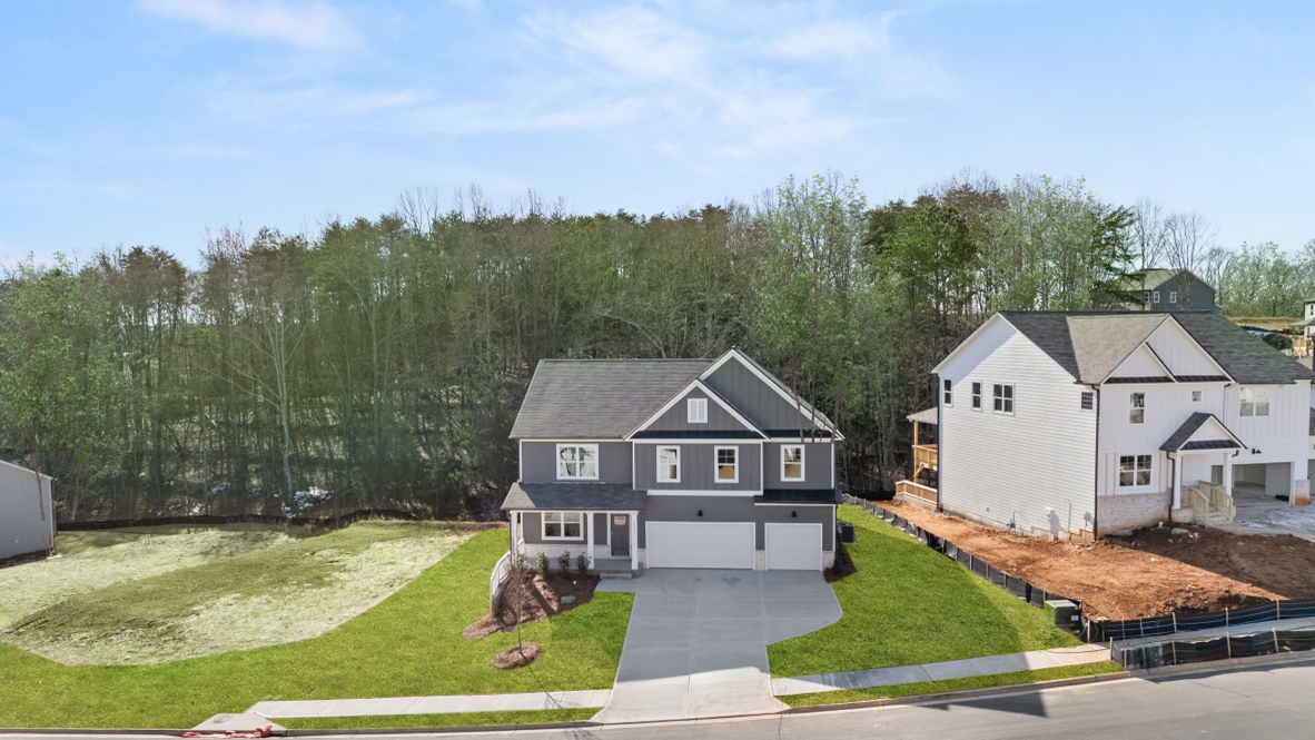 Exterior two-story home with cladding