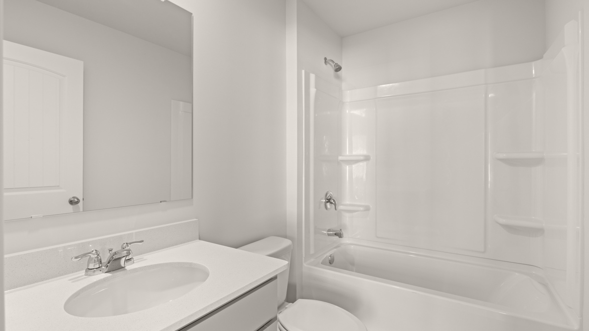 Interior bathroom with sink and full-sized shower