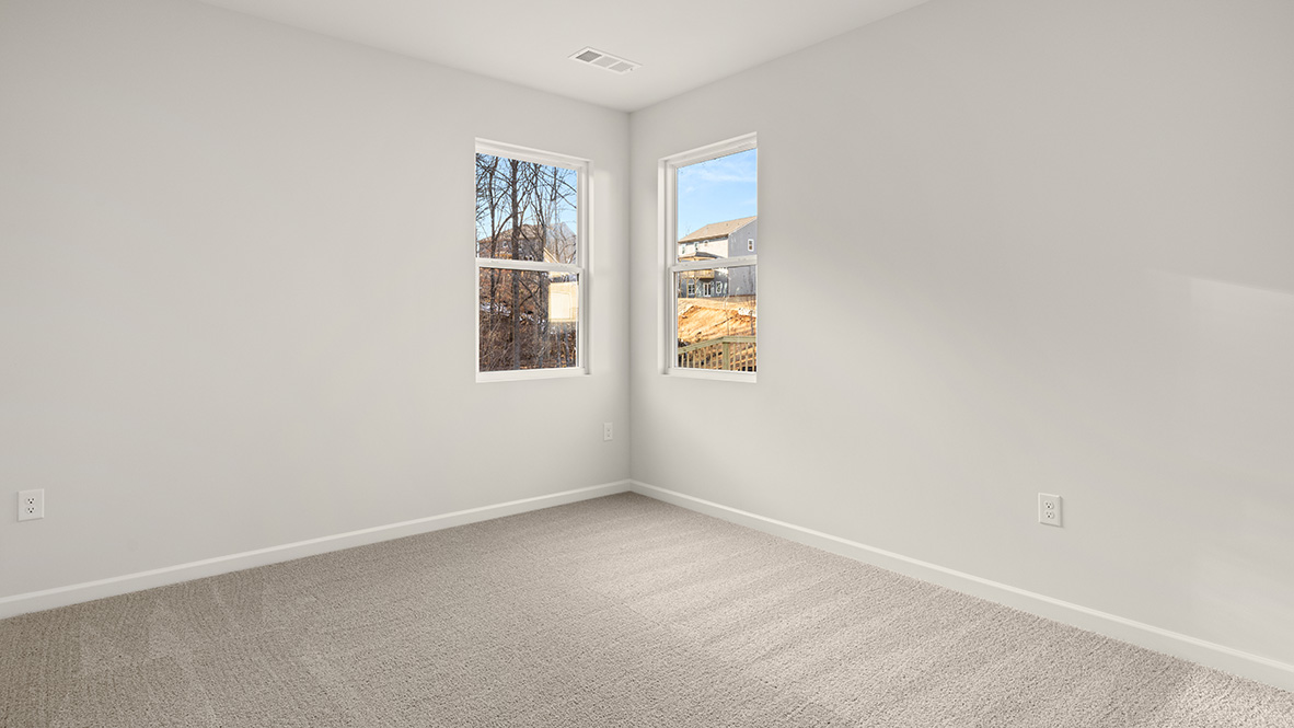 Interior bedroom with two windows