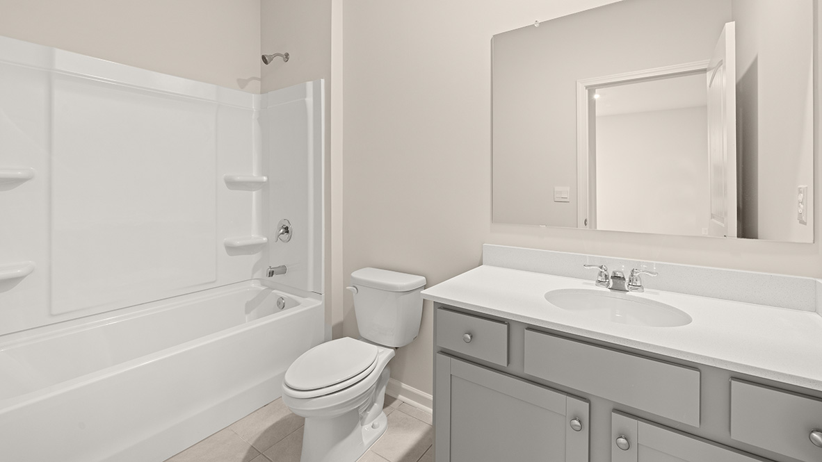 Interior bathroom with full-sized shower and sink