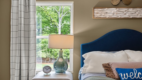Bedroom with a single window.