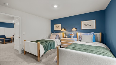 Bedroom with neutral carpet
