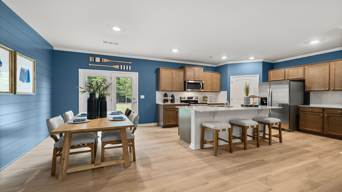 Interior living area open to dining area with kitchen