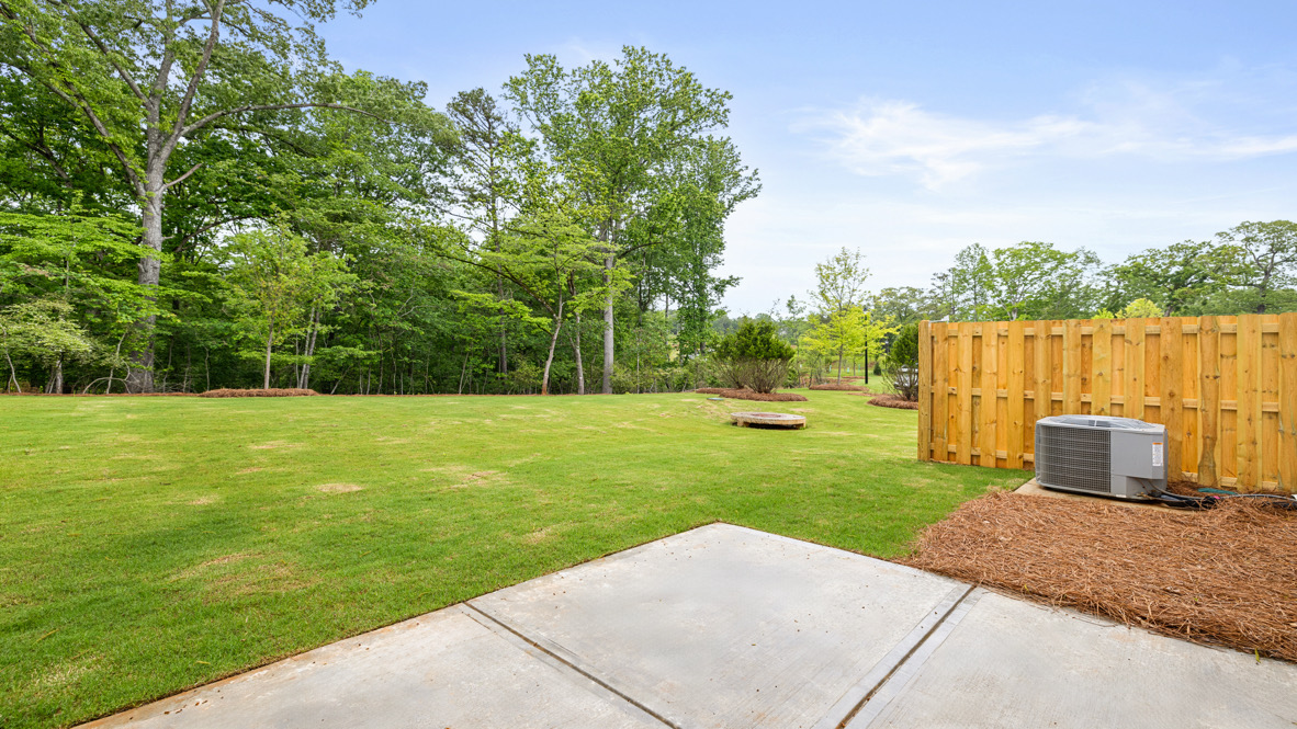 Back patio fat Falcon Landing Townhomes in Gainesville, GA