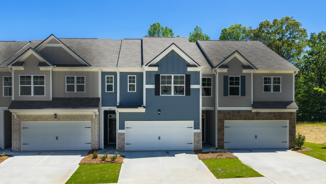 Front exterior of the Salisbury floorplan at Falcon Landing Townhomes in Gainesville, GA