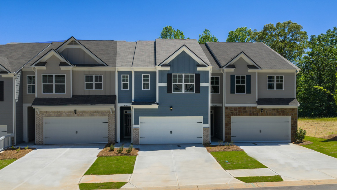 Front exterior of the Salisbury floorplan at Falcon Landing Townhomes in Gainesville, GA