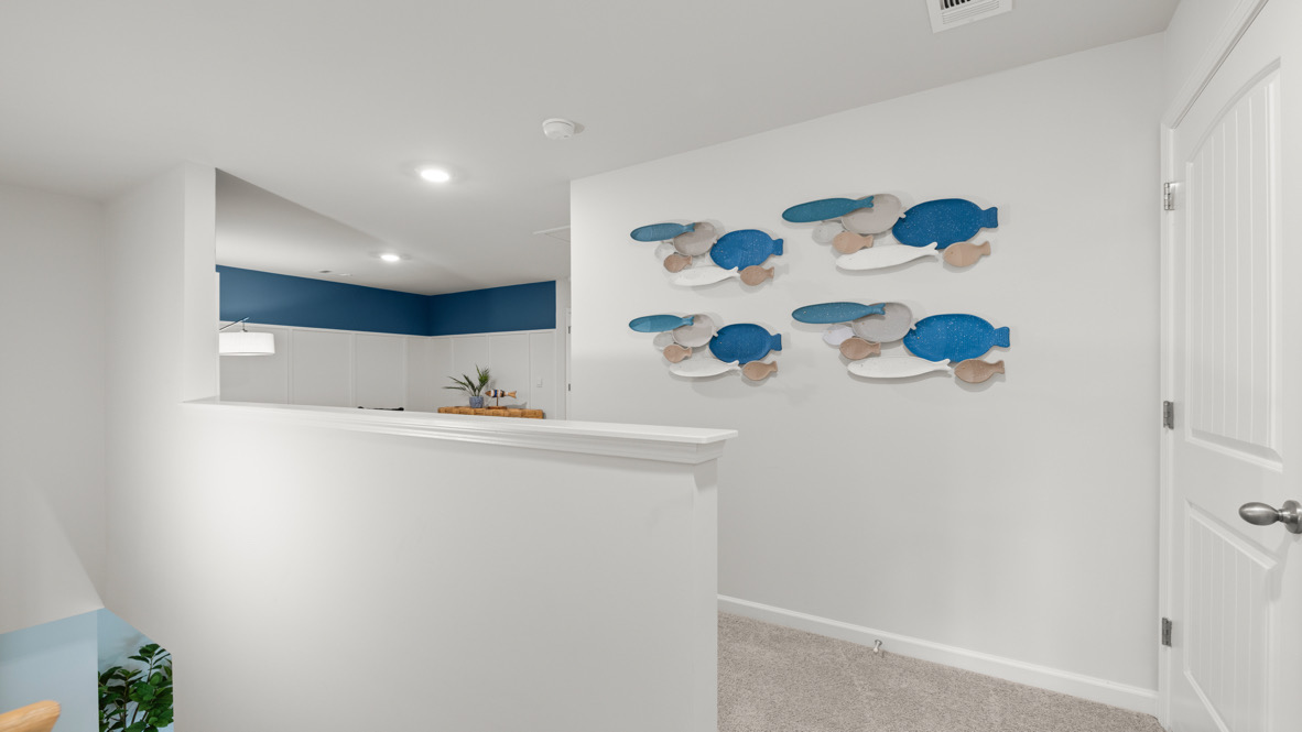 Interior upstairs loft area open to staircase