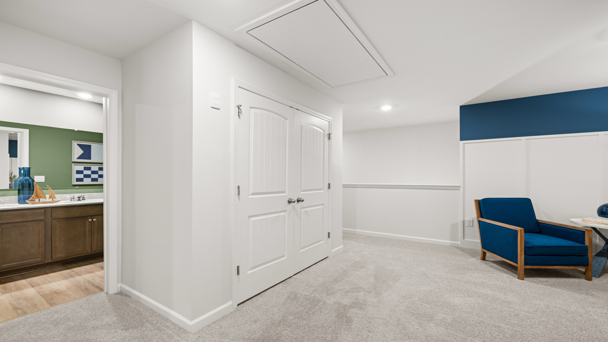 Interior upstairs loft area open to staircase