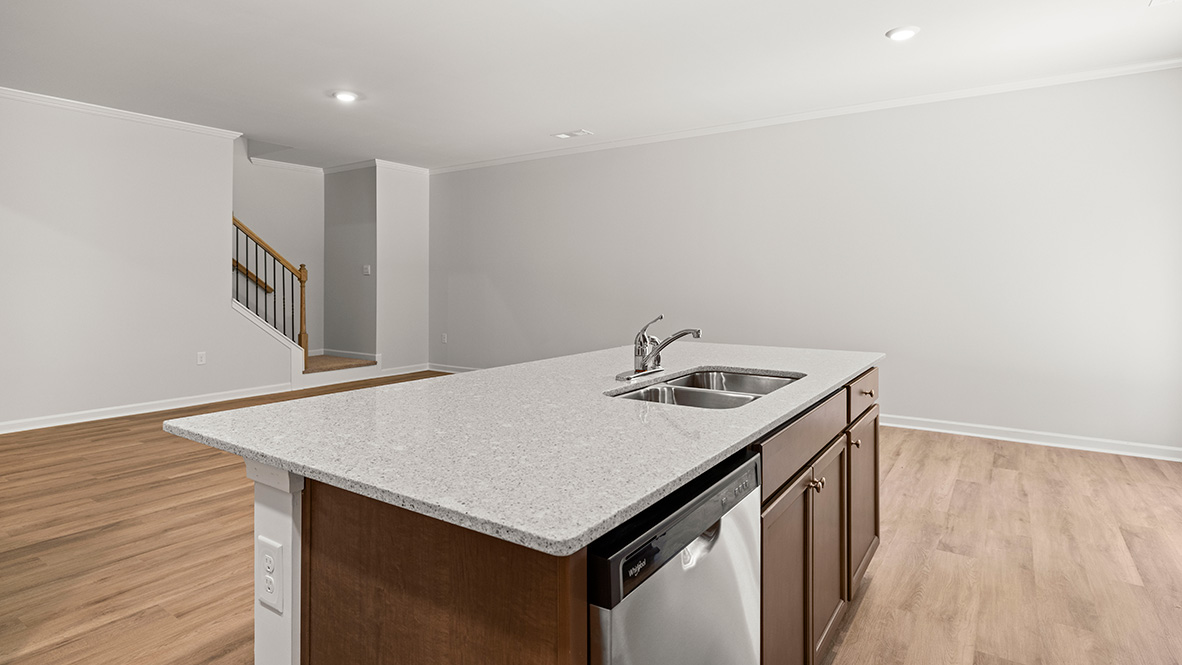Interior kitchen with center island open to living area